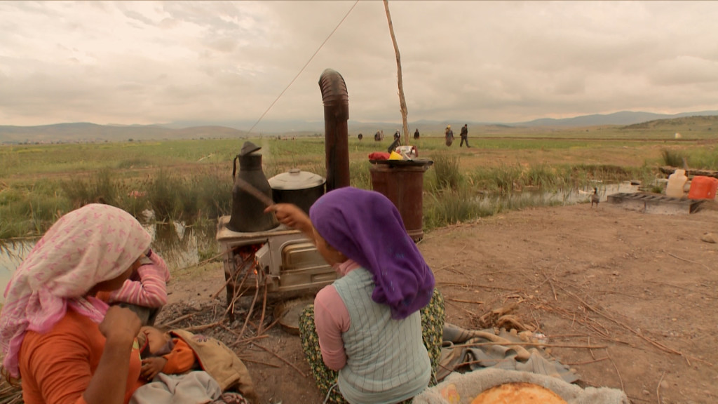 A poor crowded Kurdish family arrives from Batman to Ankara to work on the fields every year.